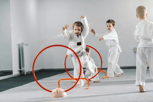 Kids celebrating at a Sunrise Taekwondo birthday party